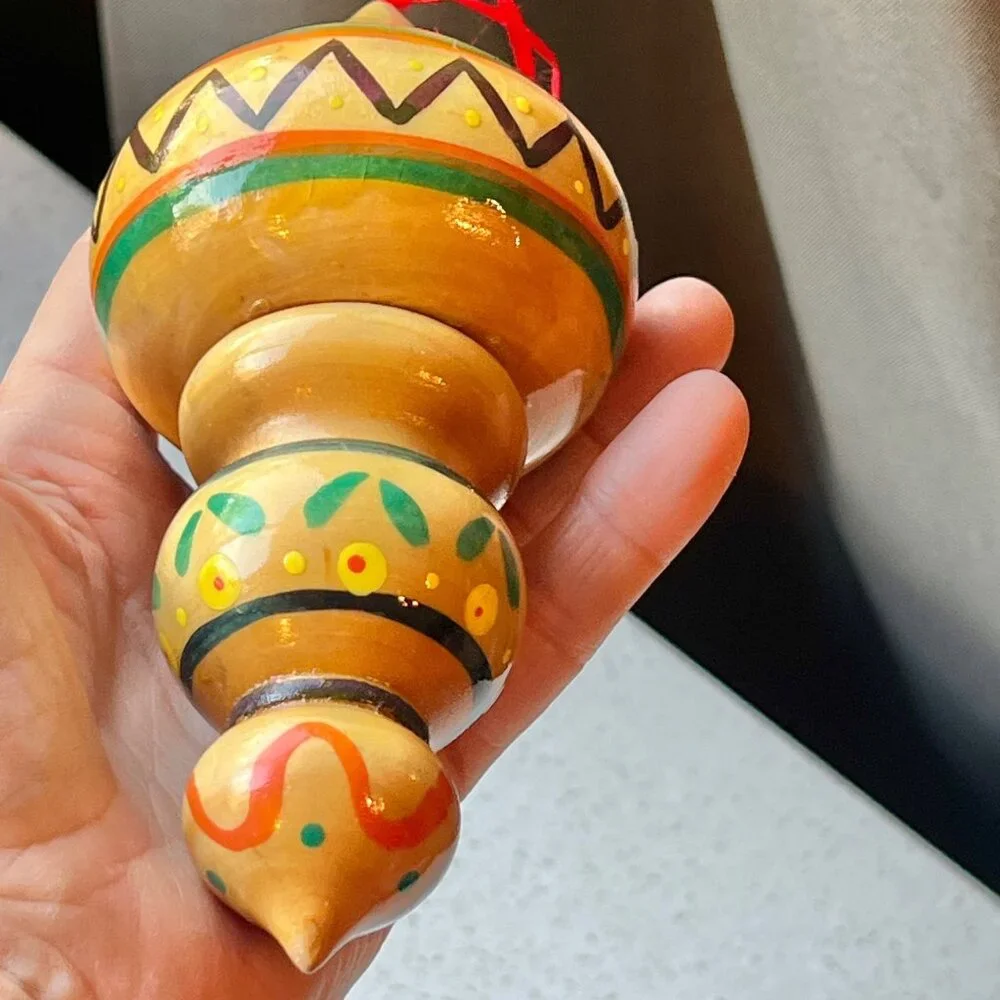 Handcrafted Wooden Hanging Ornament With Vibrant Tribal Patterns